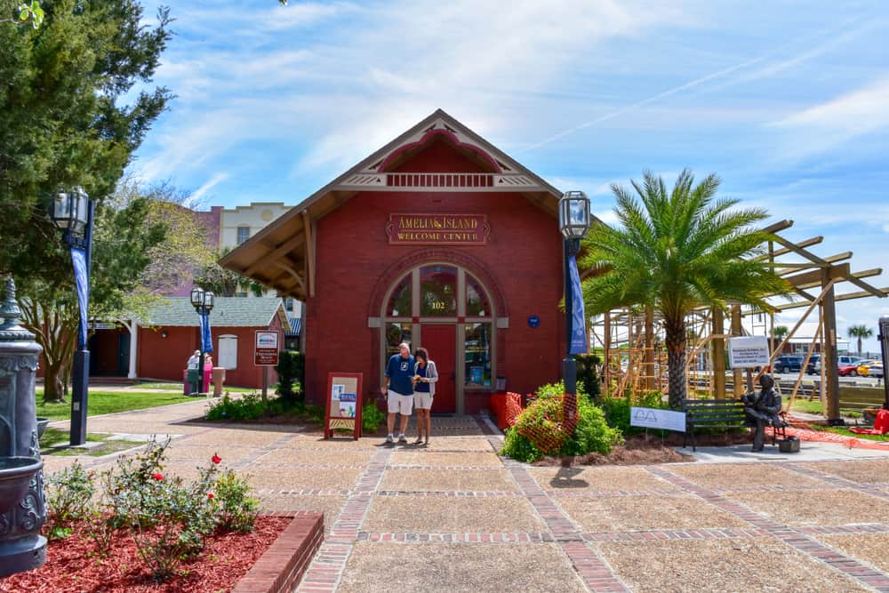 The front of the Amelia Island Visitors Center, a brick building that used to be a train depot. 