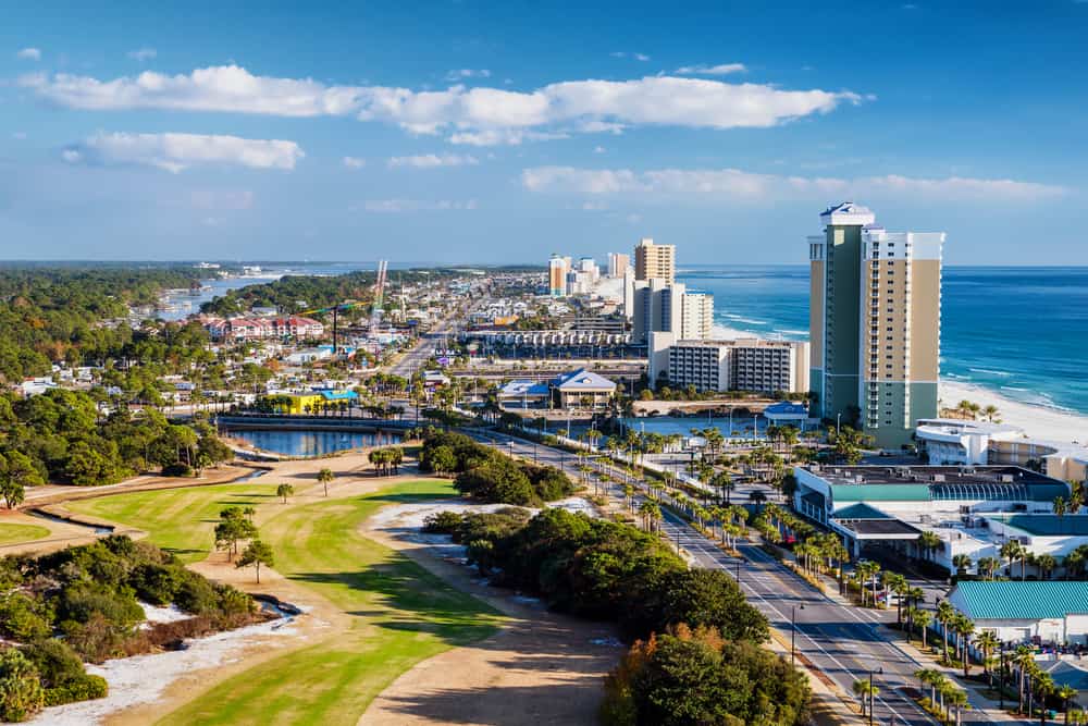 Aerial image of Panama City showing off the golf course, shops, and beach.