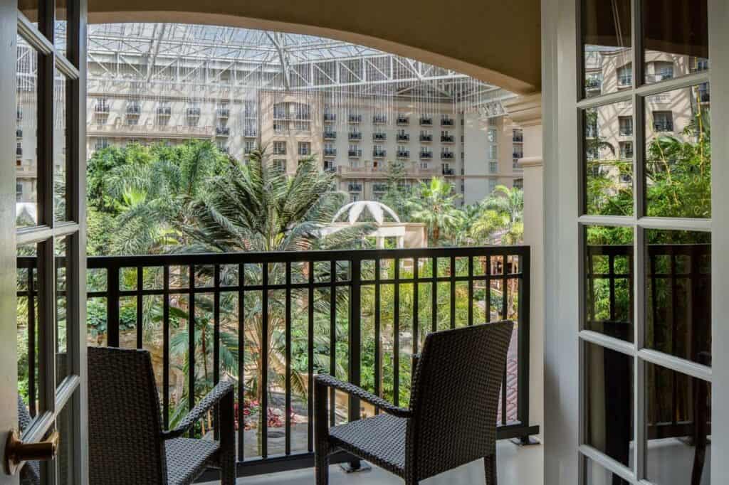 A picture of a balcony overlooking the atrium inside of the gaylord palms resort