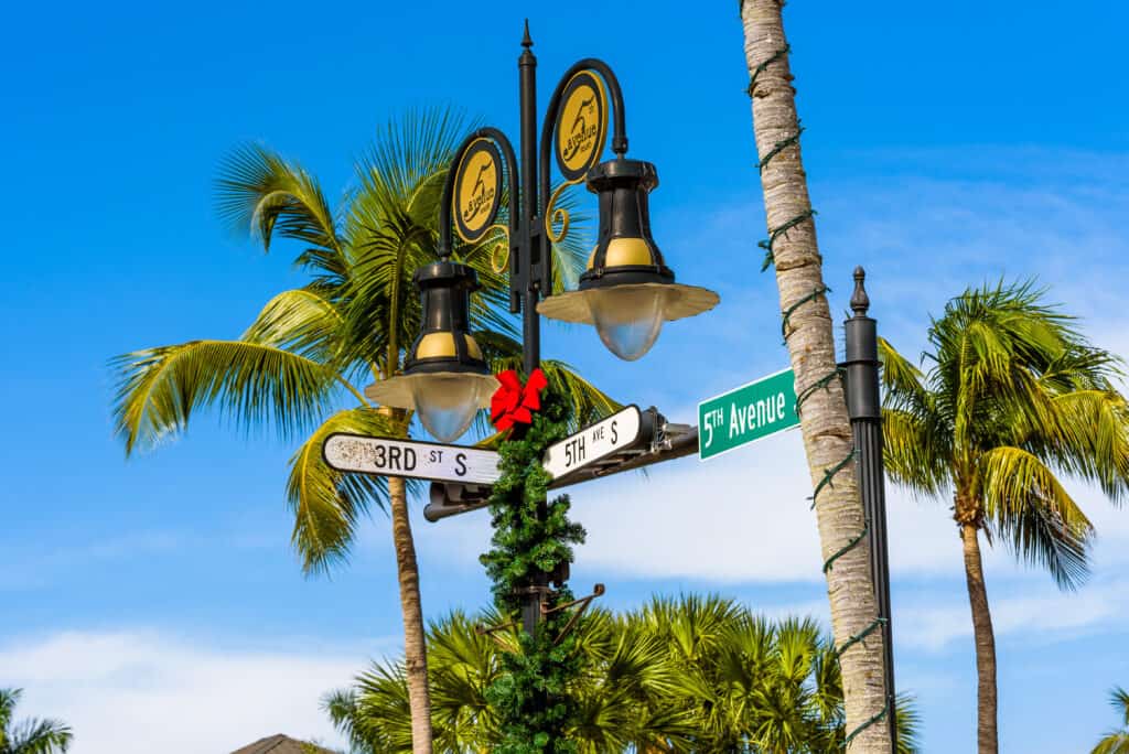 A picture of the street signs at third and fifth which mark the historic district in naples, third avenue south, one of the best things to do in southwest florida!