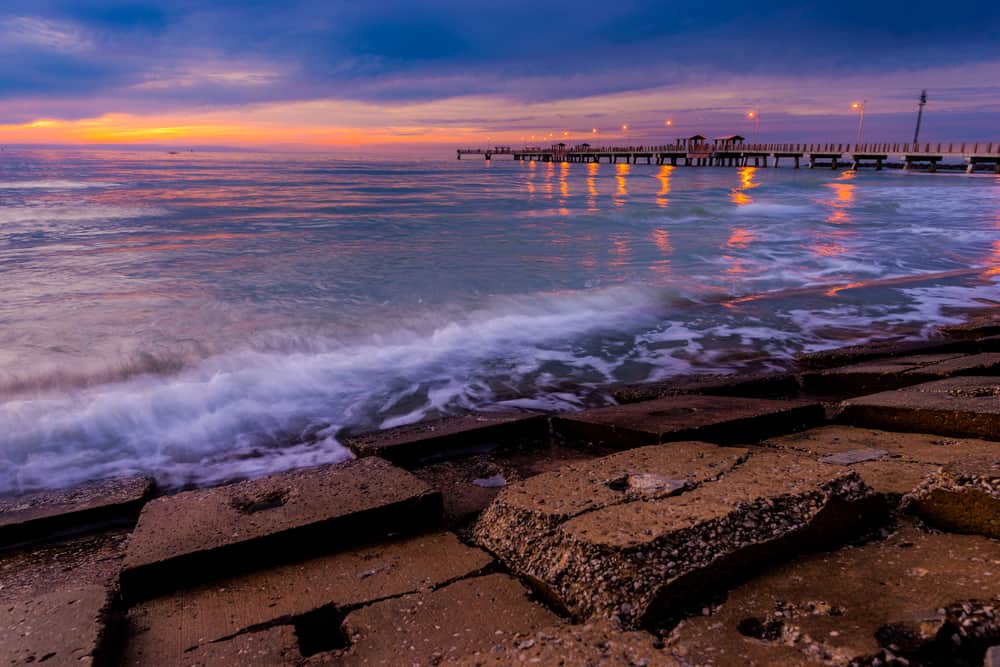 At sunset see the boardwalk and the fort ruins at fort de soto