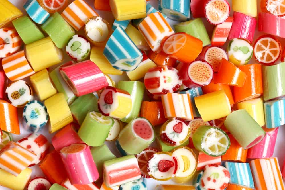 An assortment of colorful handmade, rolled candies.