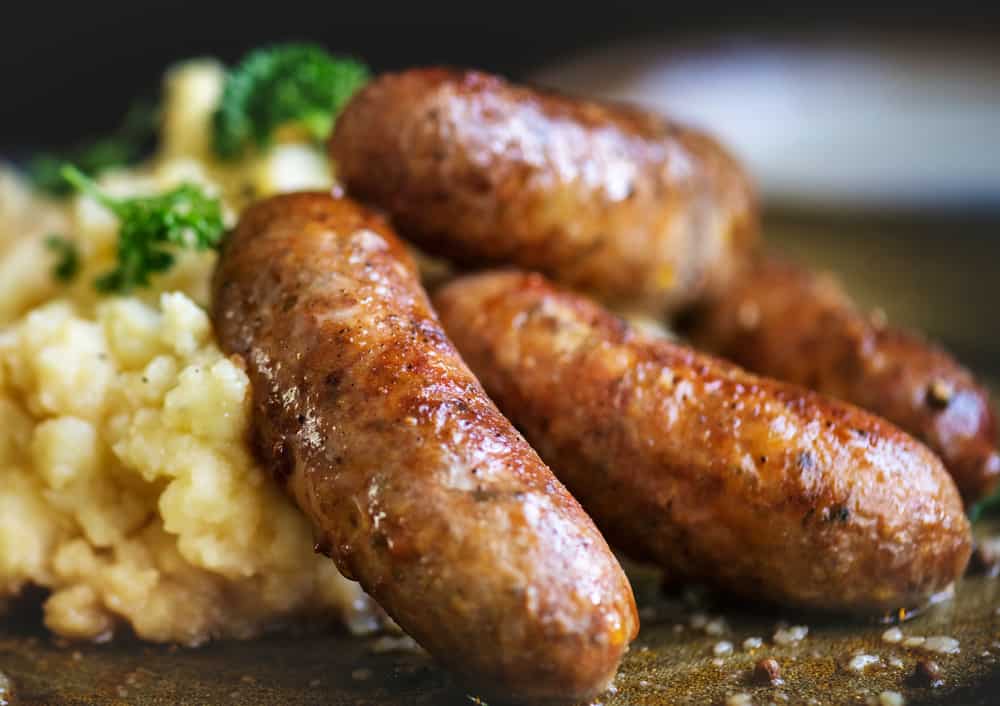 Close up of bangers and mash.