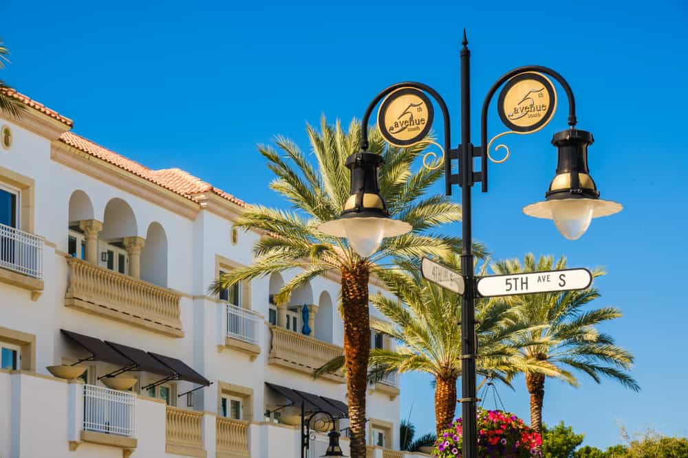 Fancy lamppost with the Fifth Avenue South sign.