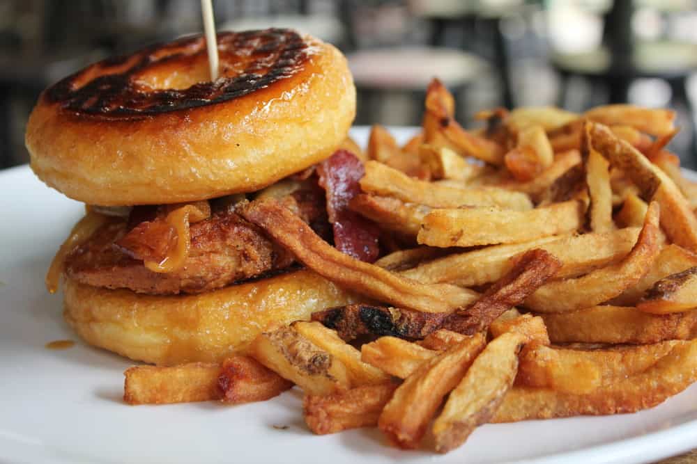 The donut burger is an interesting brunch option when considering breakfast in Saint Augustine: it features a burger on two Krispy Kreme donuts! 