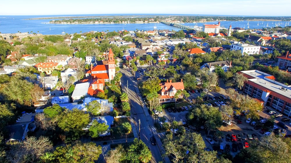 An birds eye view of Saint Augustine, FL shows the city in a great light with lots of trees, buildings and the bay too. There are plenty of great places for breakfast in Saint Augustine hidden here too! 