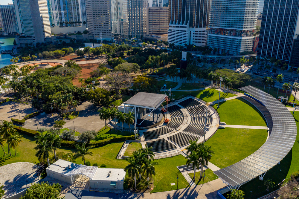 An aerial view of the amphitheater surrounded by trees in Bayfront Park, where catching a concert is the best thing to do in Miami at night.