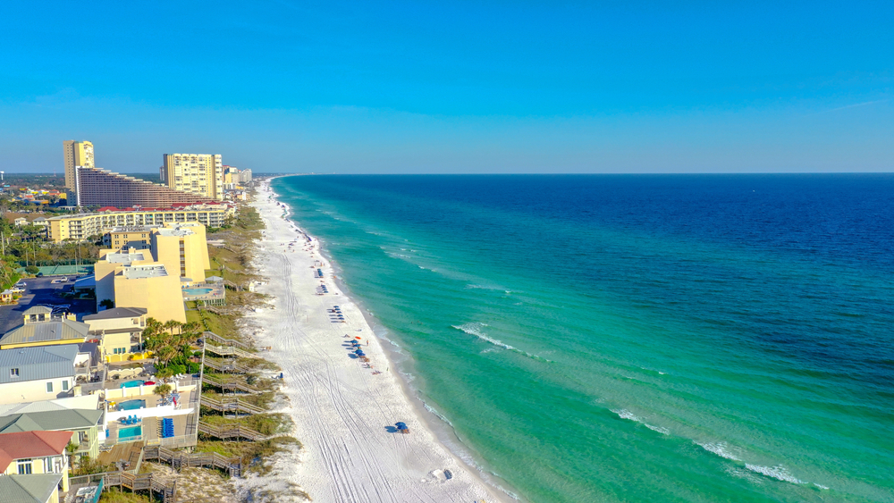 Miramar Beach is perfect for where to stay in Destin with families: the water sports accented on this emerald green coast, well stocked town, and white sand keep families coming back. 