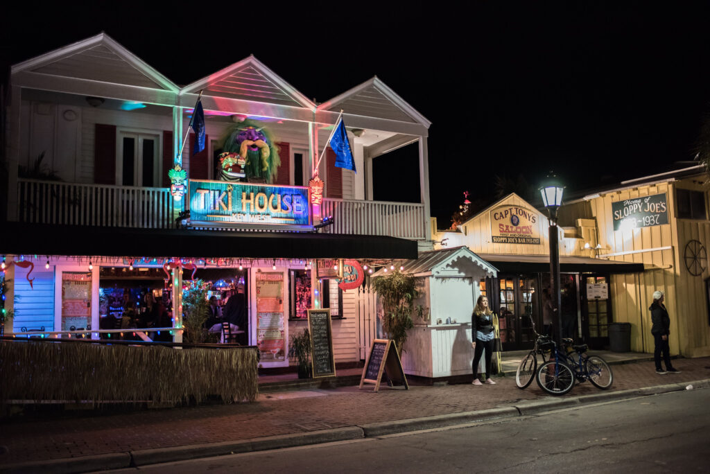 Two story building decorated with tiki decor at cool bars in Key West