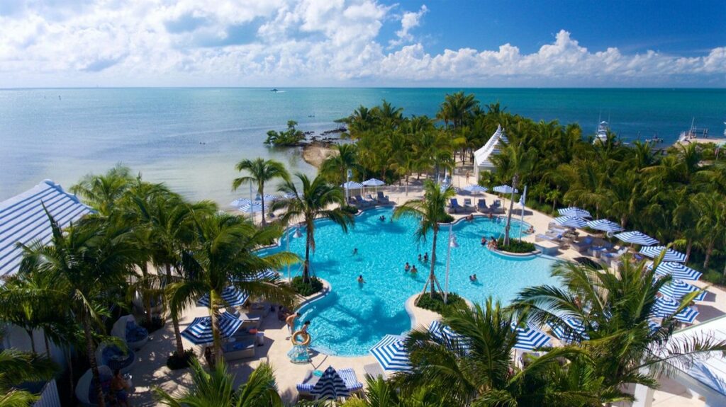 aerial image of the gorgeous blues of the water in the pool at one of the best resorts in the Florida Keys!