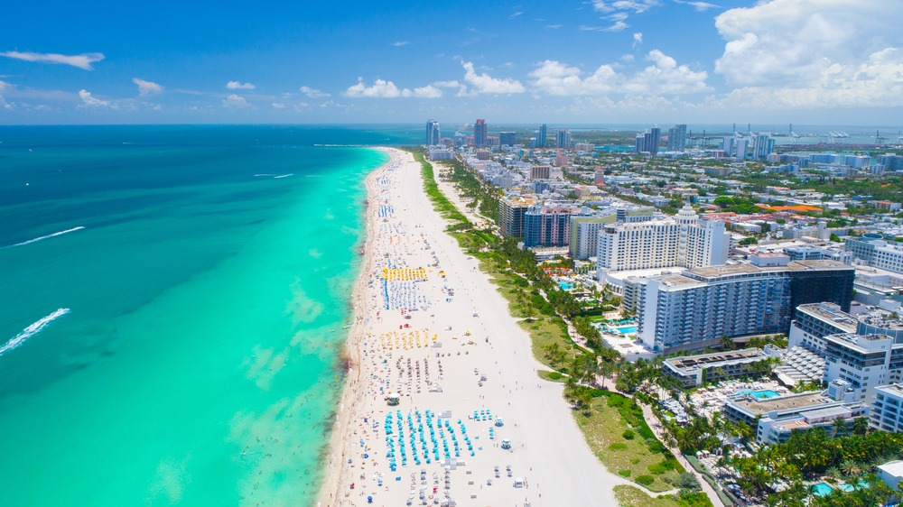 An aerial view of a beach in Florida in Miami on a sunny day
