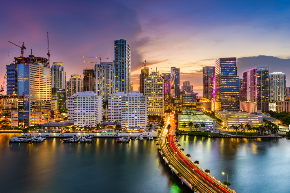 A view of the Miami skyline with all the buildings lit up at night