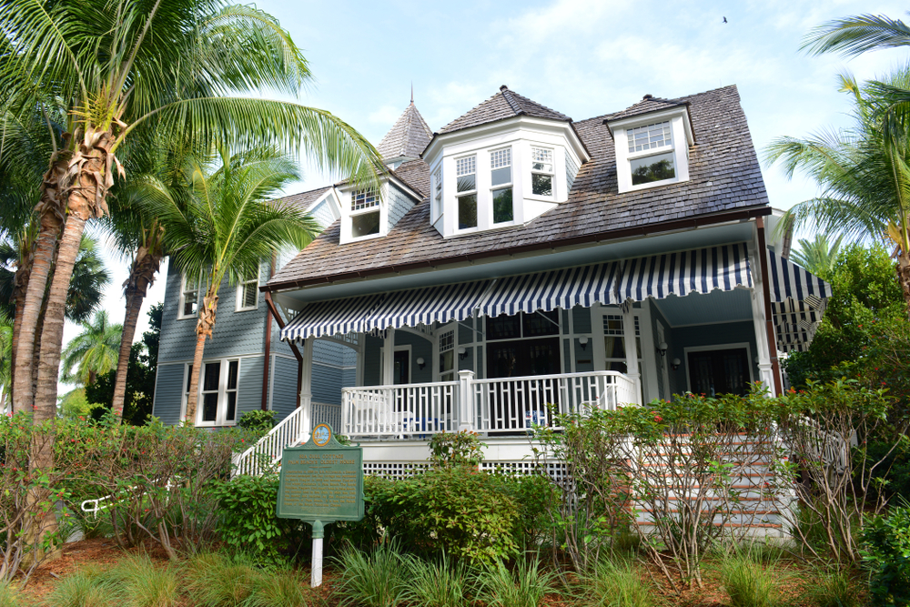 The exterior of a historic cottage, one of the best things to do in Palm Beach