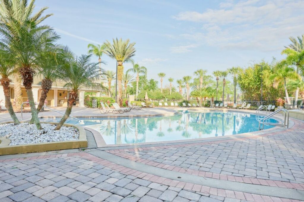 A picture of the pool area at Sonder vista Cay at sunset, where to stay in Orlando for a great time!