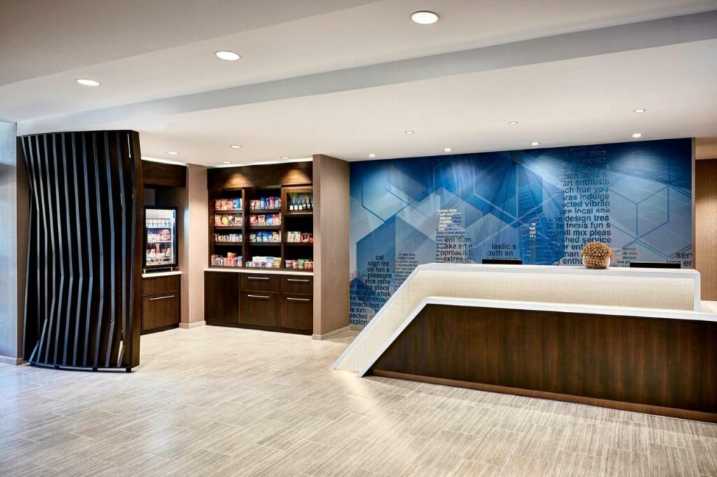 The sleek and modern looking front desk of the springhill suites by Marriot in Orlando 