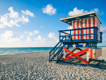miami lifegaurd station dressed up in red white and blue for florida in july