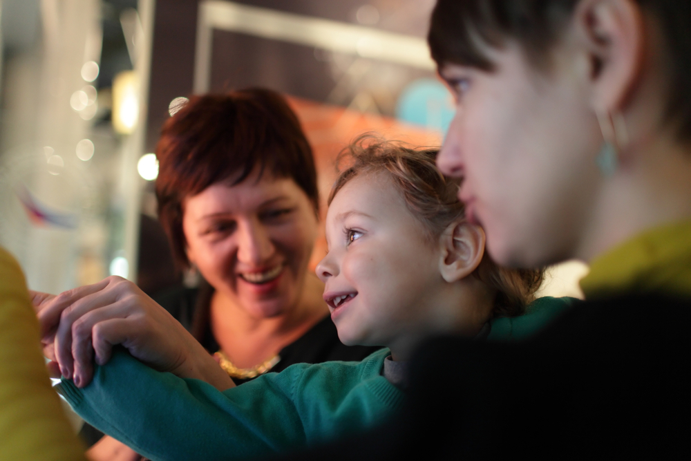 Museums that are interactive is a perfect way to do Orlando with kids, as shown in this photo as kids engage with exhibits. 