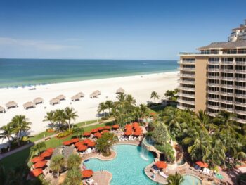 pool overlooking ocean at one of the best beach resorts in marco island