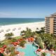 pool overlooking ocean at one of the best beach resorts in marco island