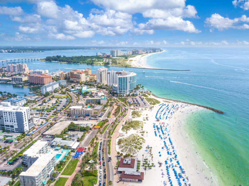 Ariel view of Clearwater Beach, Fl near a large waterway passage