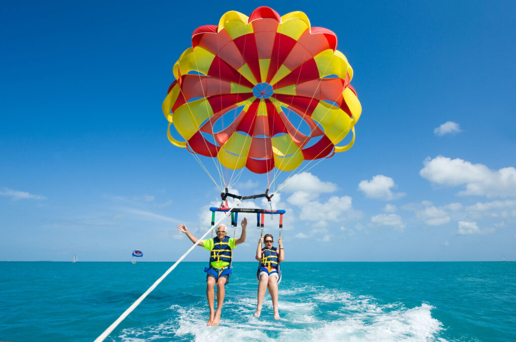 People parasailing on Florida getaways in September