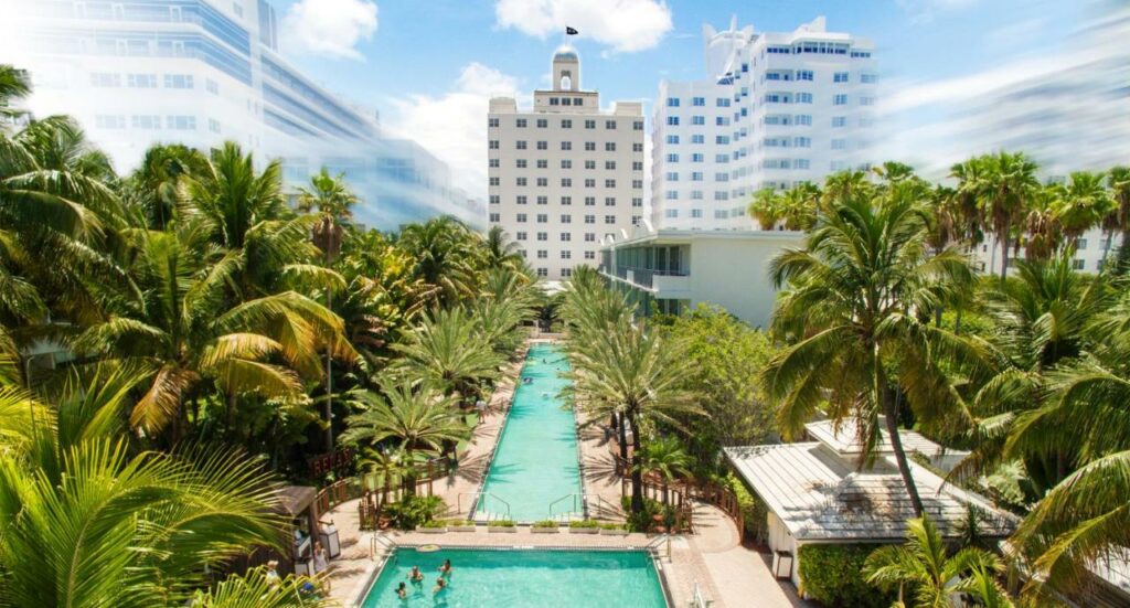 The long infifity edge pool at one of the best adults only resorts in Florida located  oceanfront on Miami beach