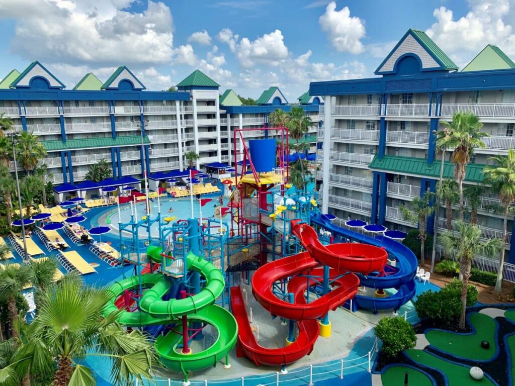 Three slides-- two open one closed, twist into a large lagoon pool at  one of best waterpark hotels in Orlando.