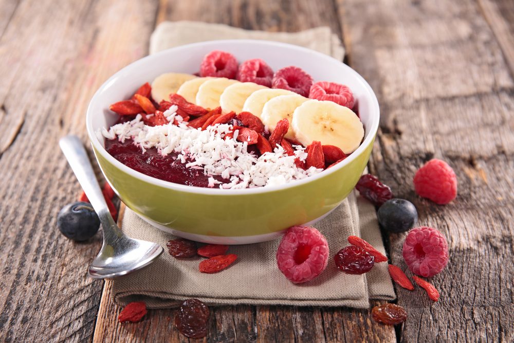 Acai bowl with lots of fruit and coconut.