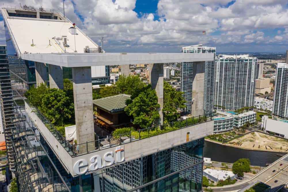 The garden-covered rooftop bar, Sugar, on top of the East hotel in Miami on a sunny day.