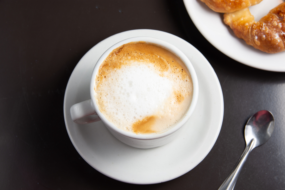 Mug of café con leche for breakfast in Miami.