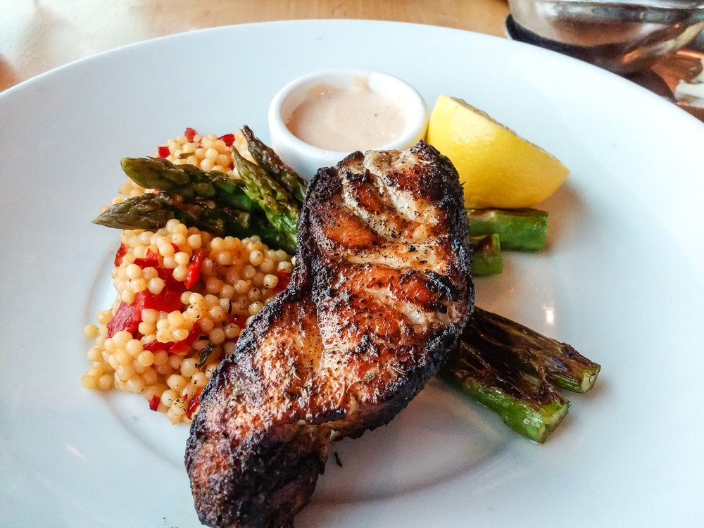 The blackened grouper over couscous and asparagus is a must try! 