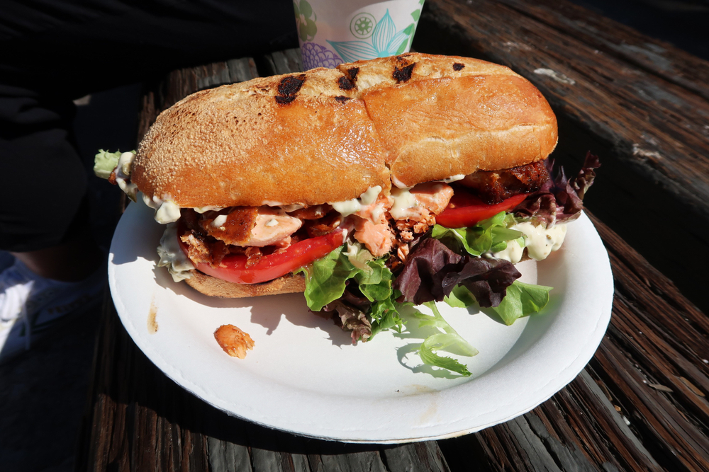 This lobster BLT is an unique take on an iconic sandwich-- the roll is toasted and the salmon is dripping with the grease from the bacon! 