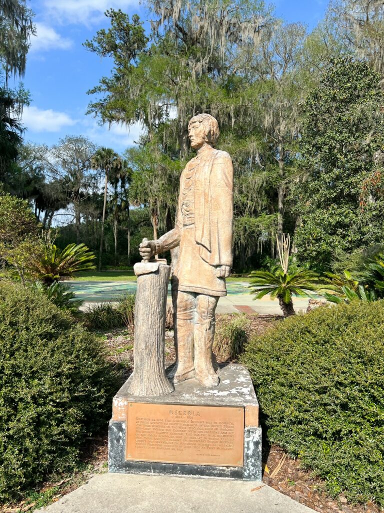 A large stature stands on one of the paths of the park, marking the history and insight of some of the movies filmed in this area-- you can still see movie props.