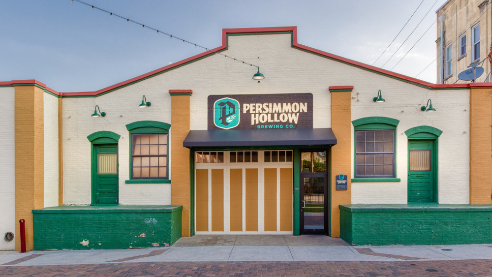 Exterior of the Persimmon Hollow Brewing Co. housed in a old building.
