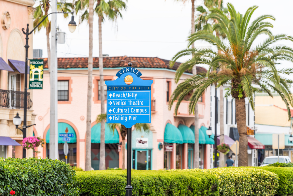 A directional street sign in a beach town best things to do in Venice Florida