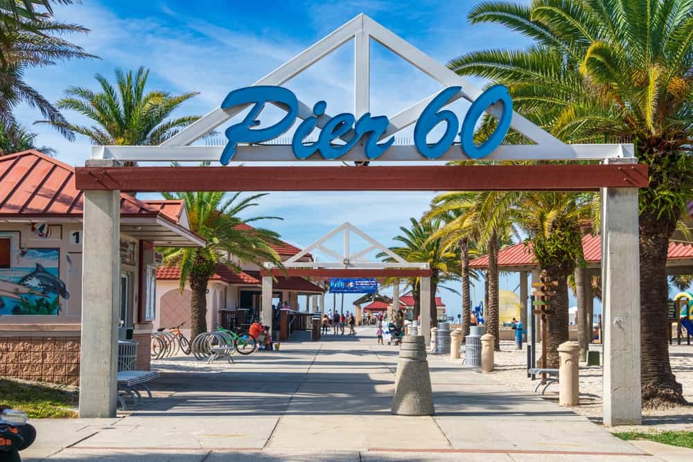 The sign of Pier 60 welcomes guests to the pier of Clearwater which offers snacks, shops, fishing and liver entertainment. 