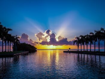 Sunrises in Florida are always stunning, with bright oranges and yellow that transcend above blue waters and purple skies.