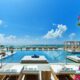 hotel on the beach in florida with pink flowers