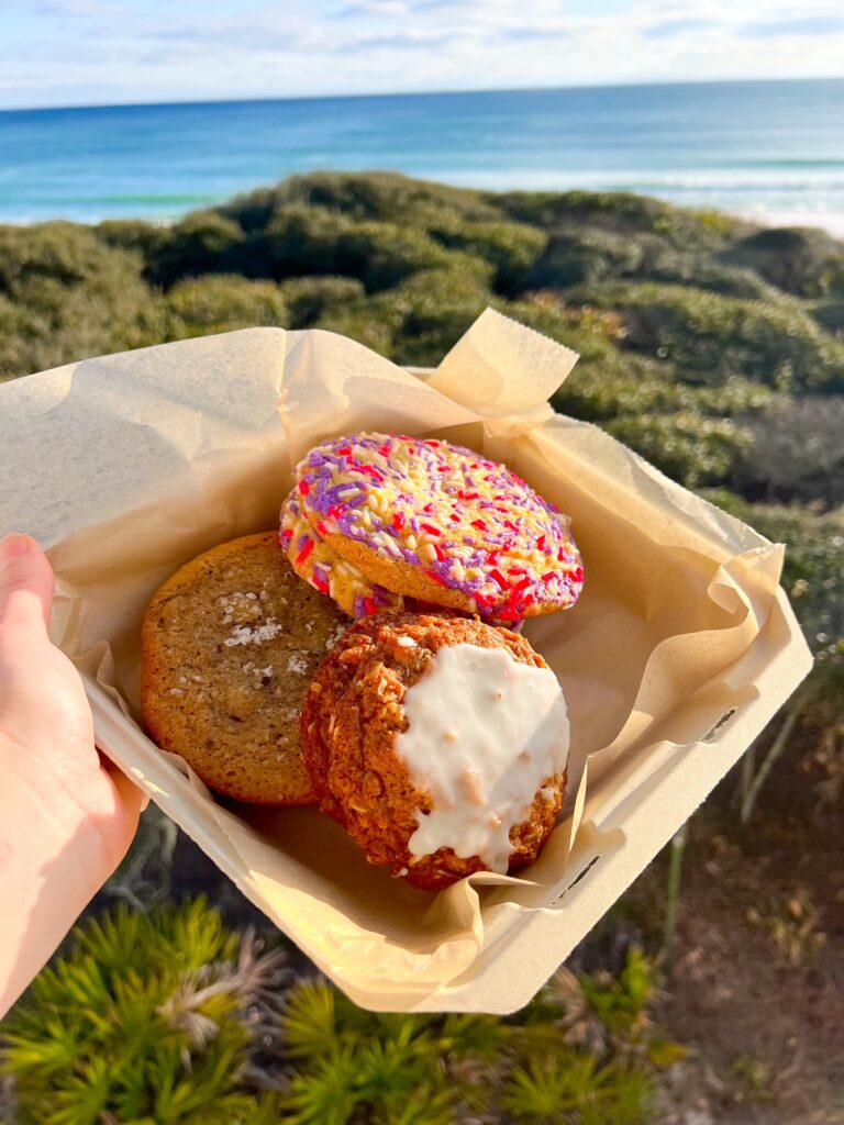 a box of pastries overlooking the ocean