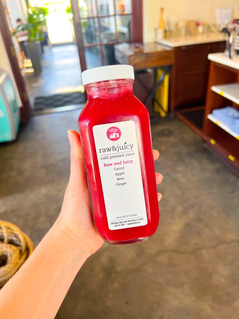 a bottle of fresh juice at raw and juicy