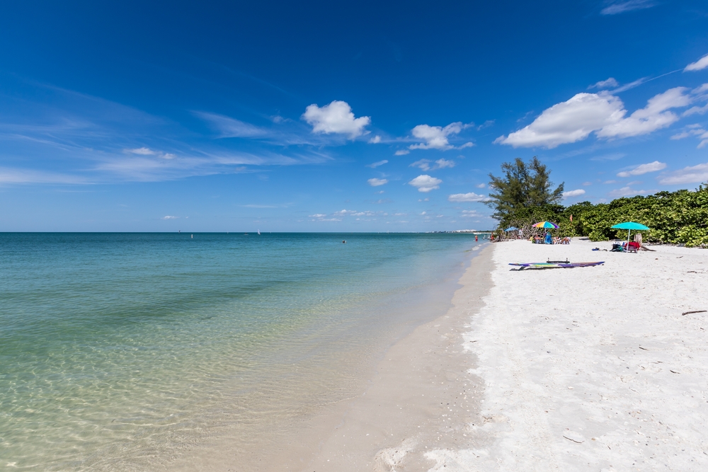 Of all the warmest beaches in Florida, Delnor Wiggins Park has soft sand and clear water, as well as natural trees and mash on the coastline perfect for exploring. 