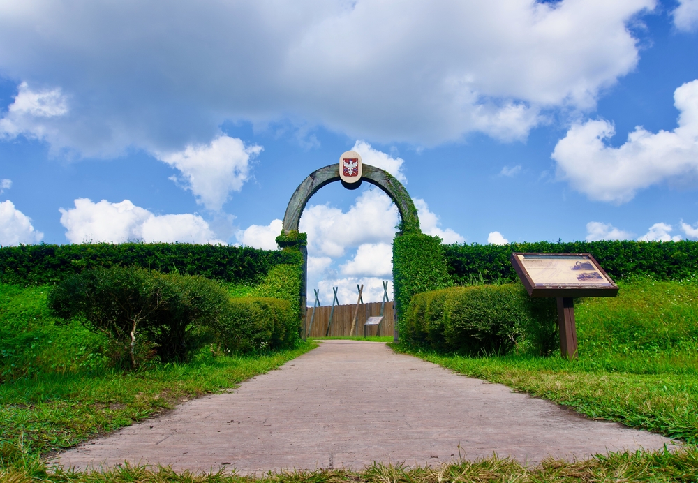 entrance to fort carolina in florida, photo taken on a sunny day and there are some clouds in the sky 