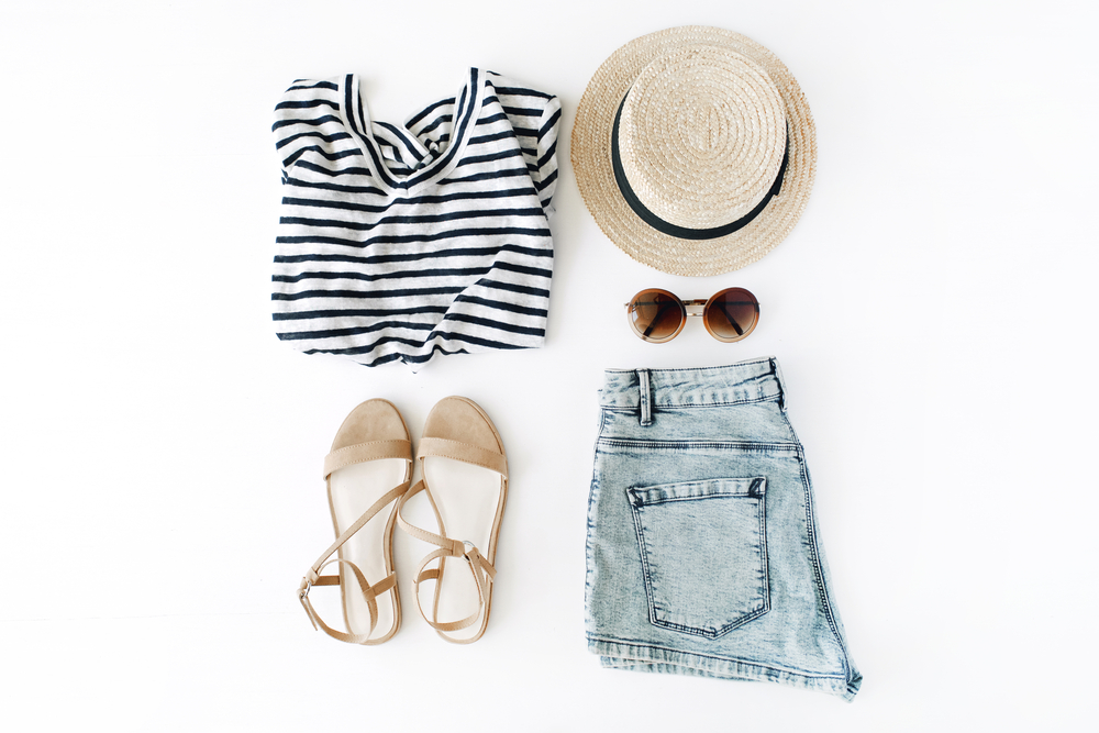 What To Wear In Florida In Summer: Florida Outfit idea for summer is jean shorts, stripped shirt and hat with sandals