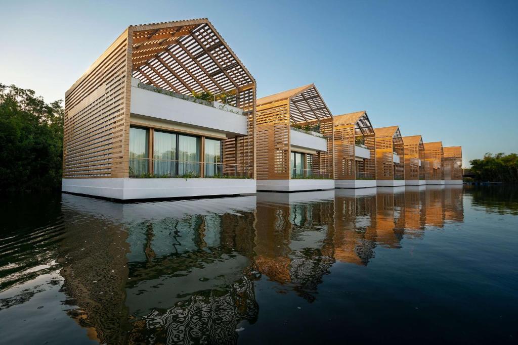 wonderful roms over a lake with slated roofs and balconies. 