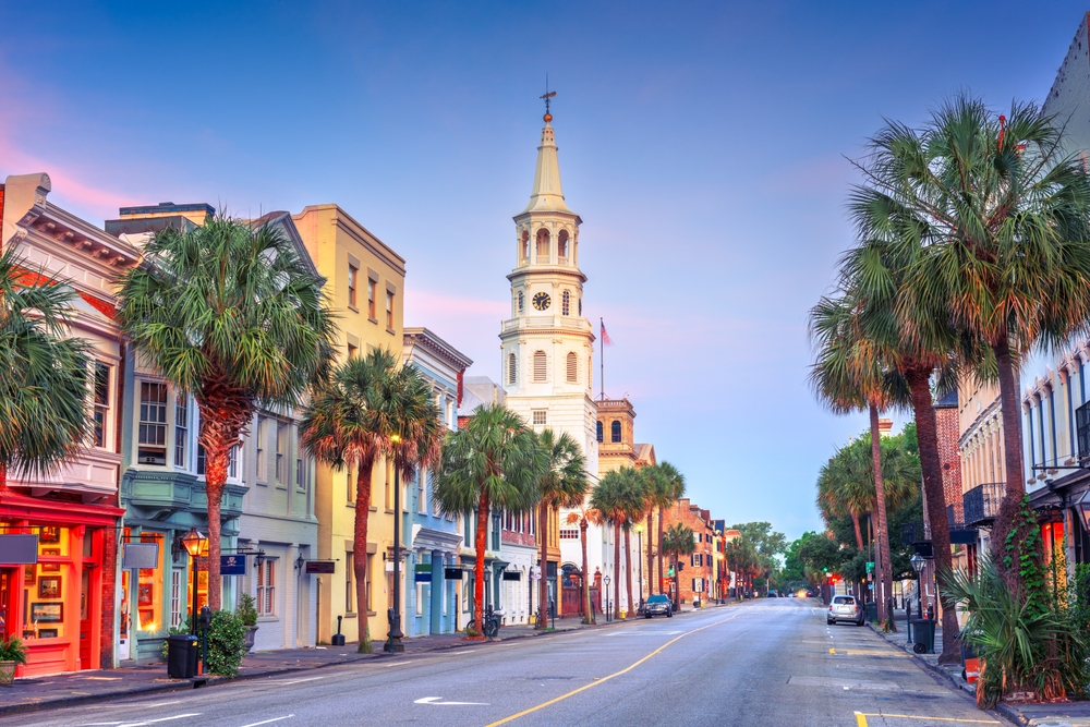 At dusk, the downtown area of Charleston is quaint and artsy, with fun colored buildings to explore: this is one of the cheapest places to fly from Fort Lauderdale.