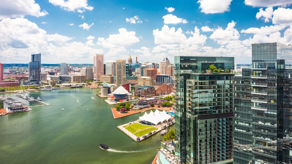 An overhead shot of Baltimore shows the martine wonders of the city: boats, plots going out into the water, and more!
