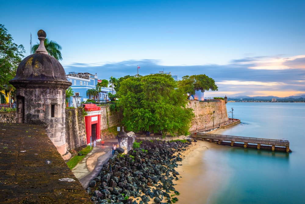 San Juan's coast is sandy, and then rocky, water lapping at the shore as Spanish style forts and buildings arch up into the town.