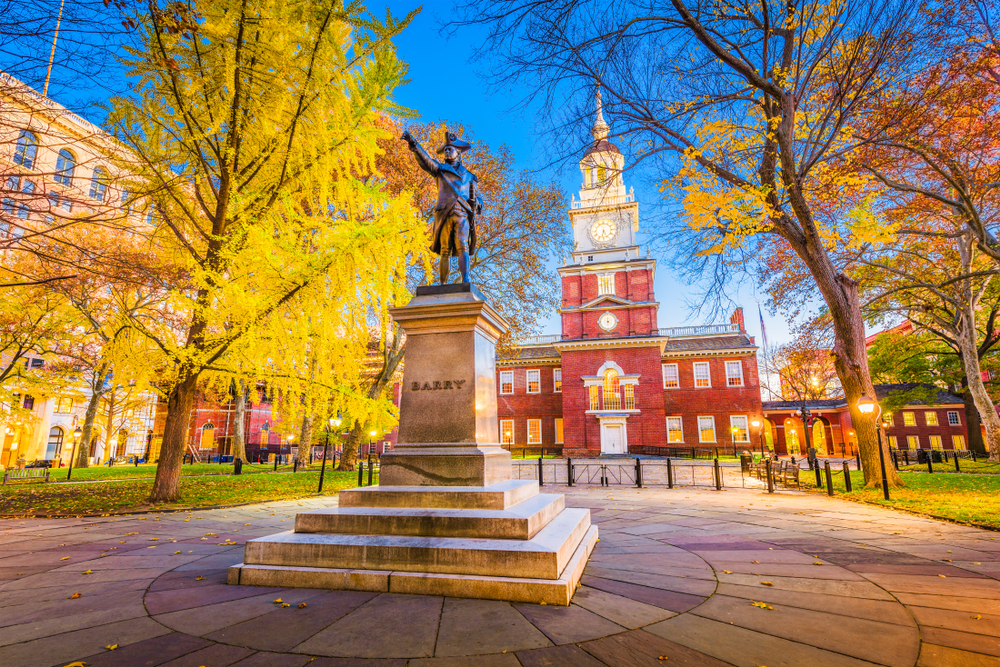 A famous statute points in our direction, Liberty hall the backdrop, trees turning fall colors around it: this is one of the cheapest places to fly from Orlando-- Philly!