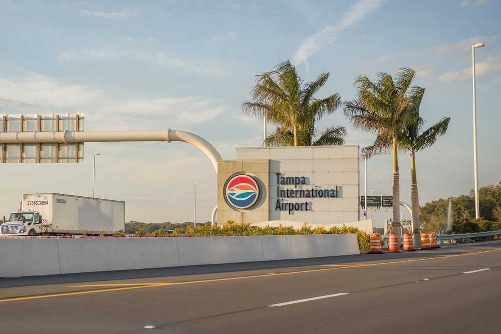 The Tampa International Airport sign welcomes guests as they enter the world of traveling from the highway, palm trees in the wind, as guests know they are getting the cheapest places to fly from Tampa form here!