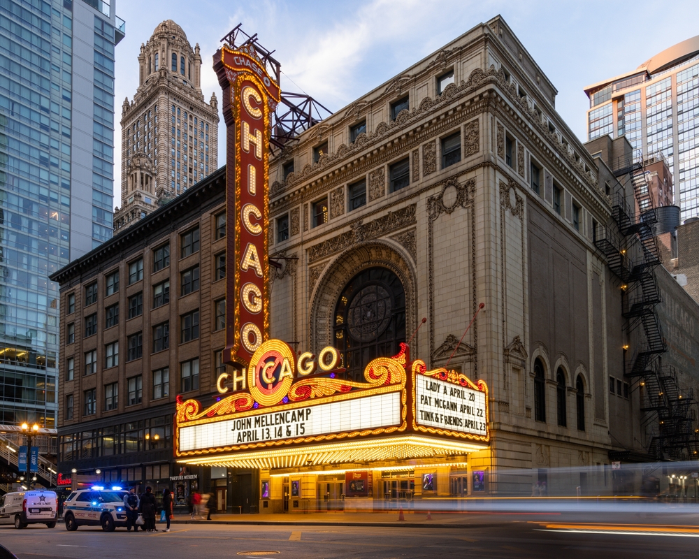 Chicago theatre lights at dusk.